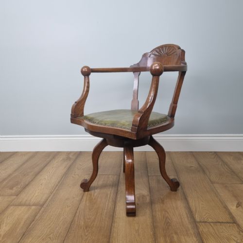 A LATE 19TH CENTURY OAK SWIVEL DESK CHAIR - ADDITIONAL PHOTO 1
