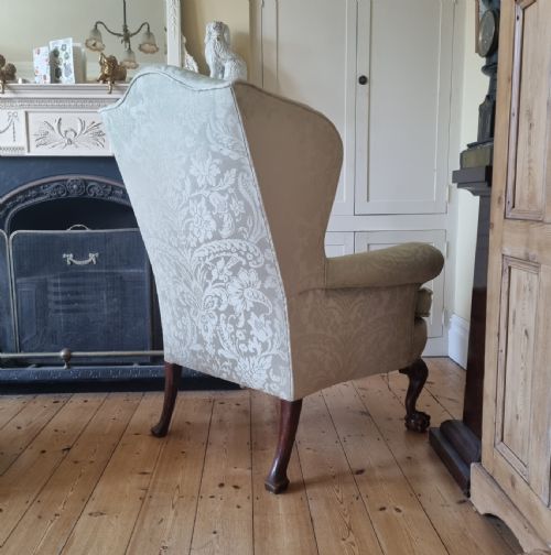 A FINE QUALITY 1920'S CLAW BALL WING ARMCHAIR FOR REUPHOLSTERY - ADDITIONAL PHOTO 2