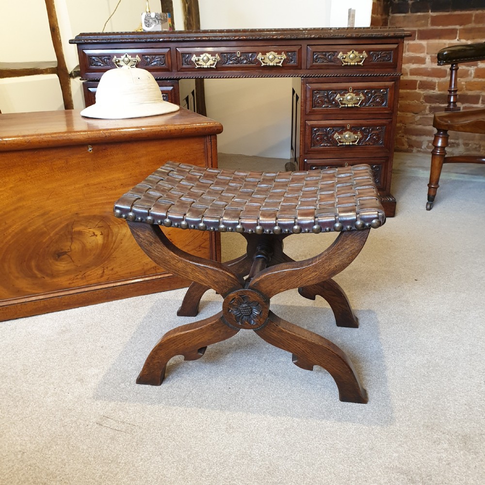 An oak & leather lattice seated Arts & Crafts 'x' frame stool View IV