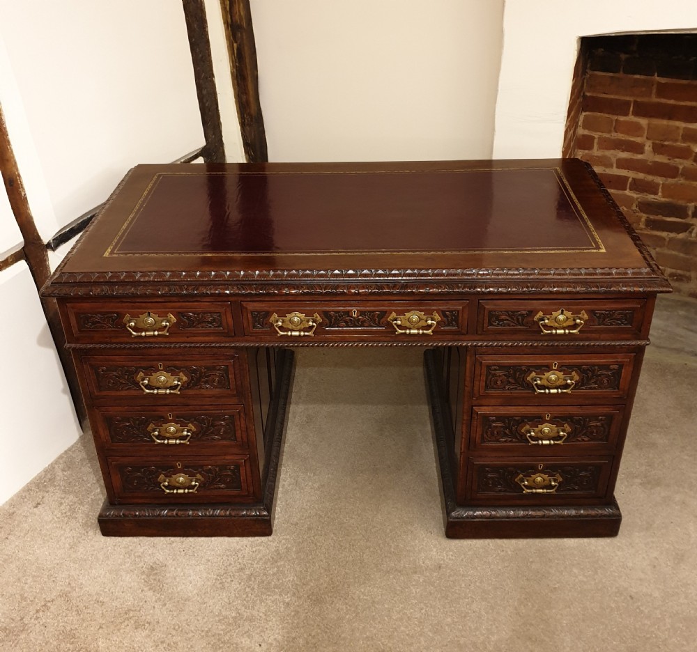 A finely carved & panelled mahogany pedestal desk  View III