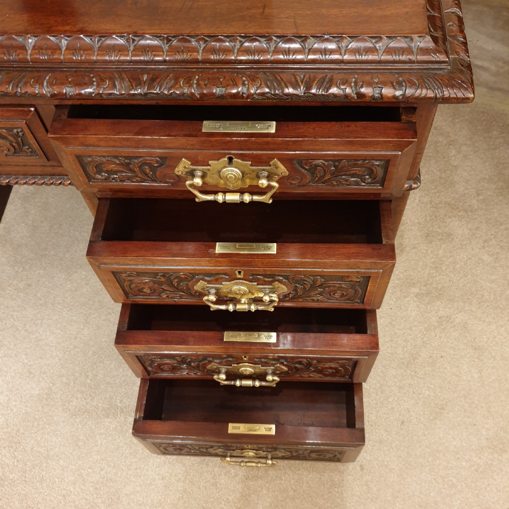 A finely carved & panelled mahogany pedestal desk  View IV