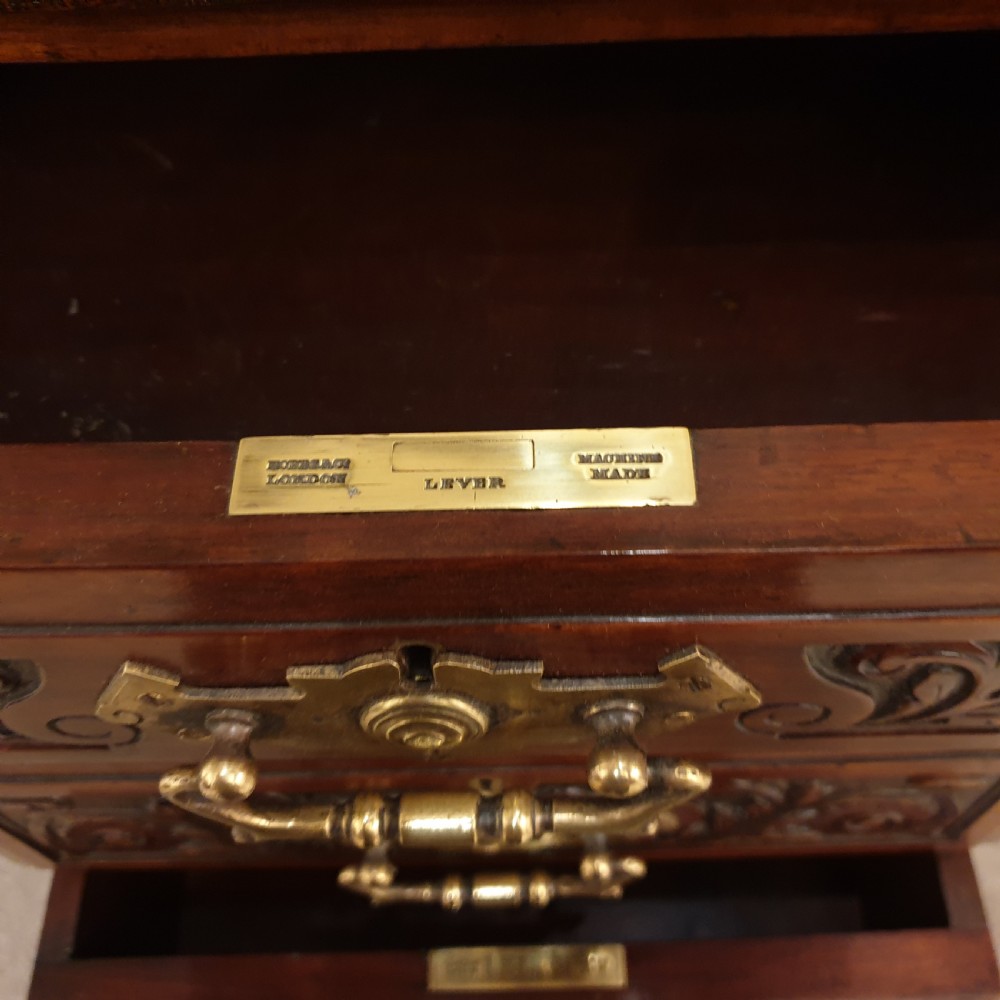 A finely carved & panelled mahogany pedestal desk  View VI