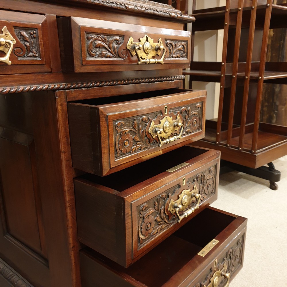 A finely carved & panelled mahogany pedestal desk  View VII