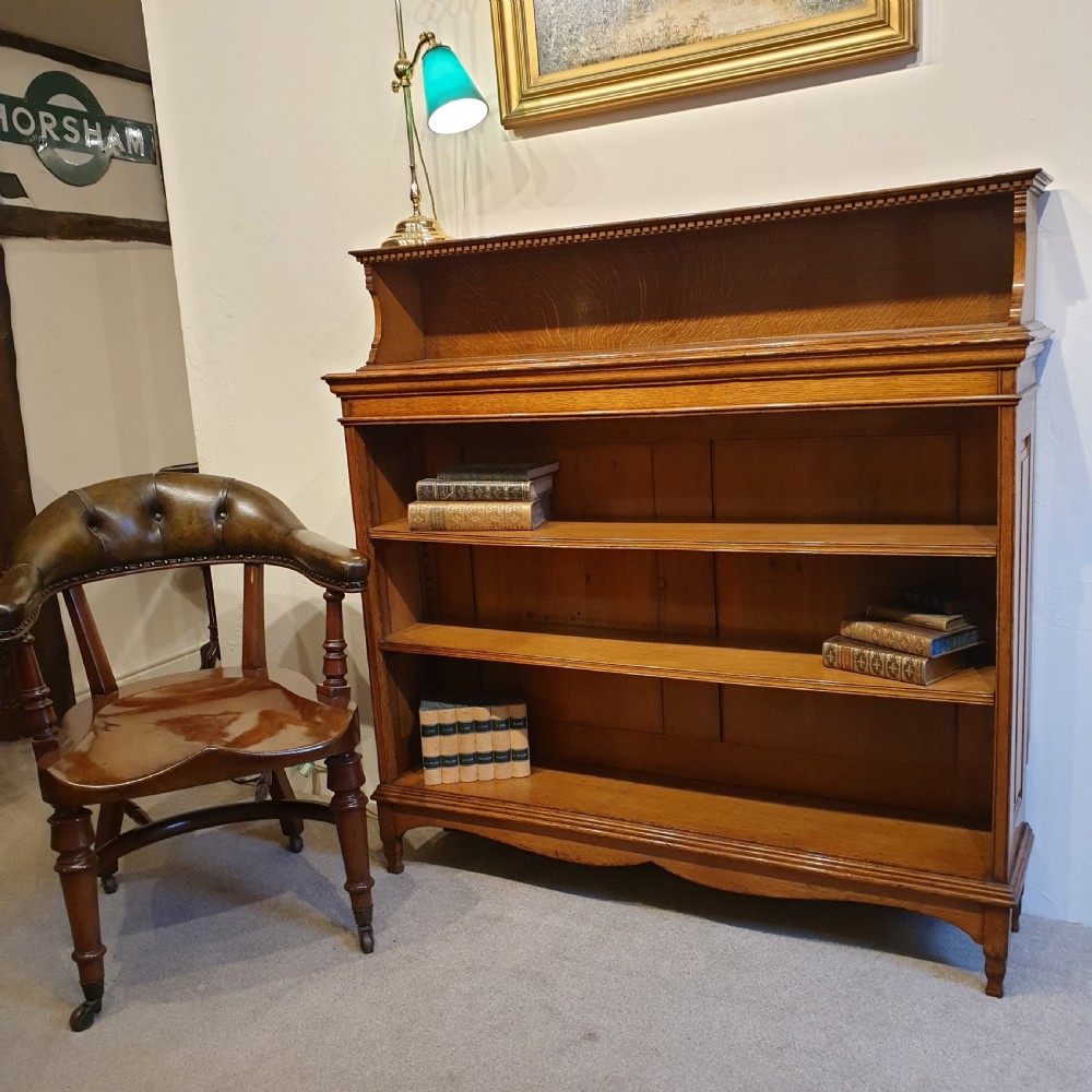 A Golden Oak Open Bookcase  View II