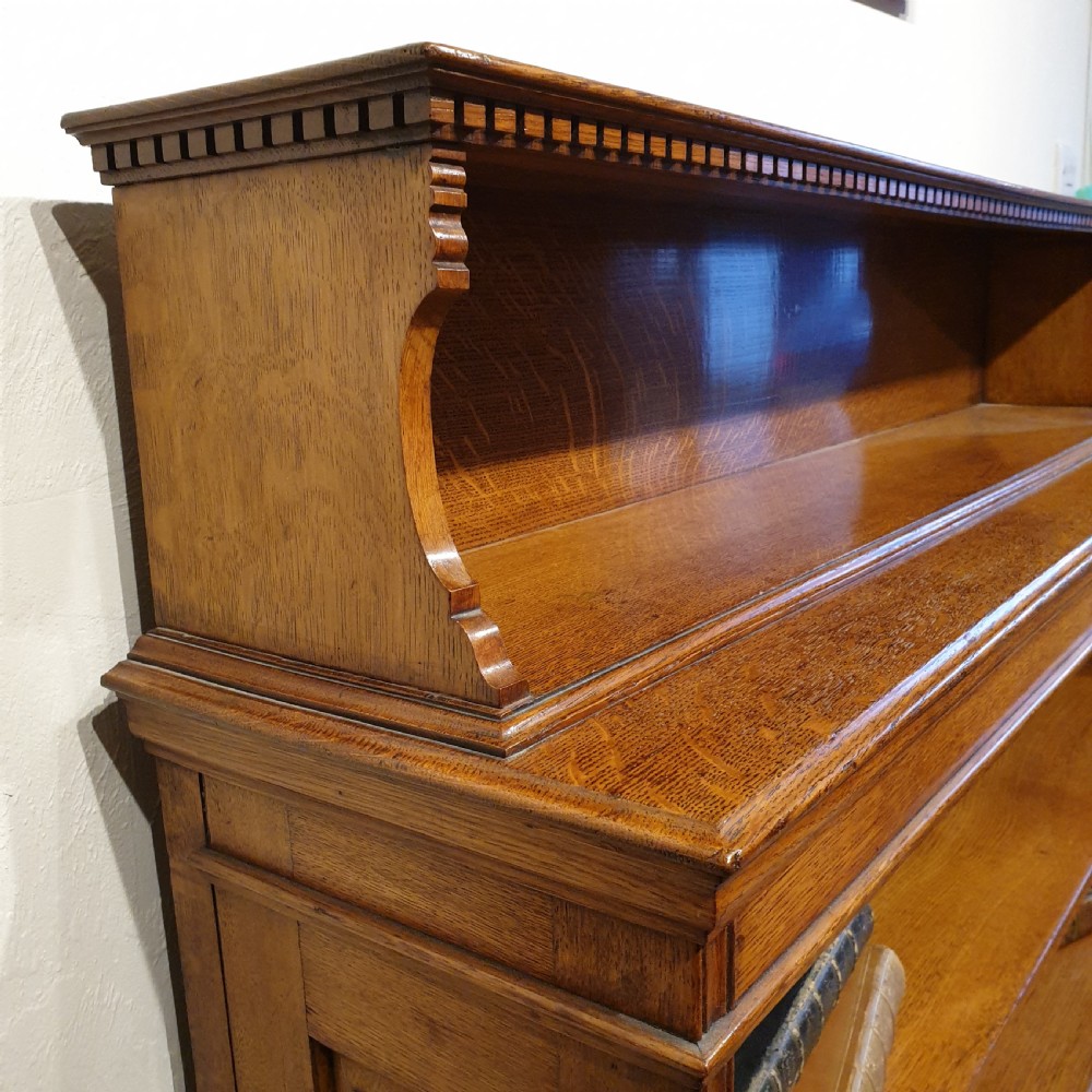 A Golden Oak Open Bookcase  View III