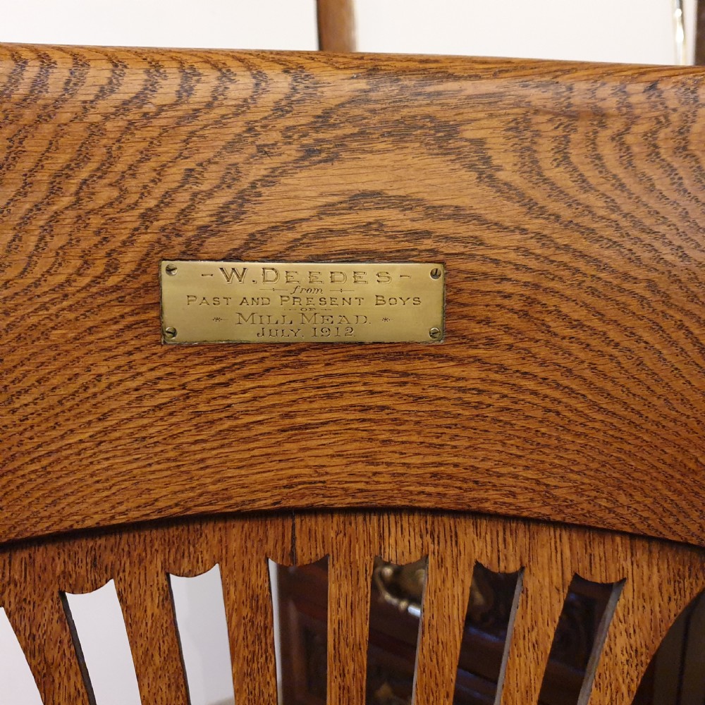 Light oak & leather seated revolving desk chair - presented to W Deedes by the past & present boys in 1912 View III