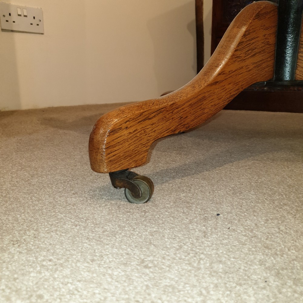 Light oak & leather seated revolving desk chair - presented to W Deedes by the past & present boys in 1912 View VII