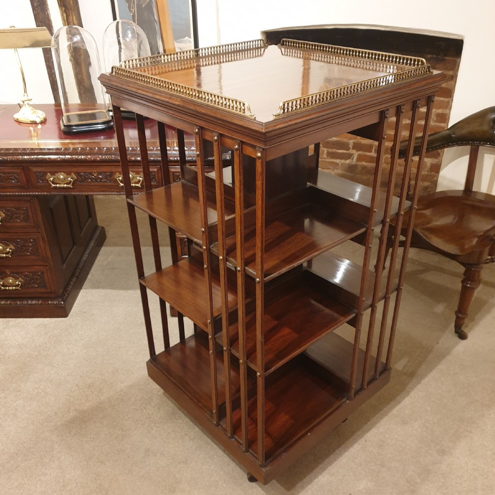 A mahogany revolving library bookcase with galleried top.  View II