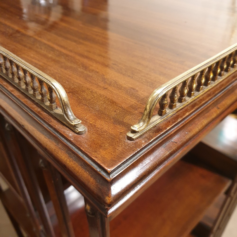 A mahogany revolving library bookcase with galleried top.  View III