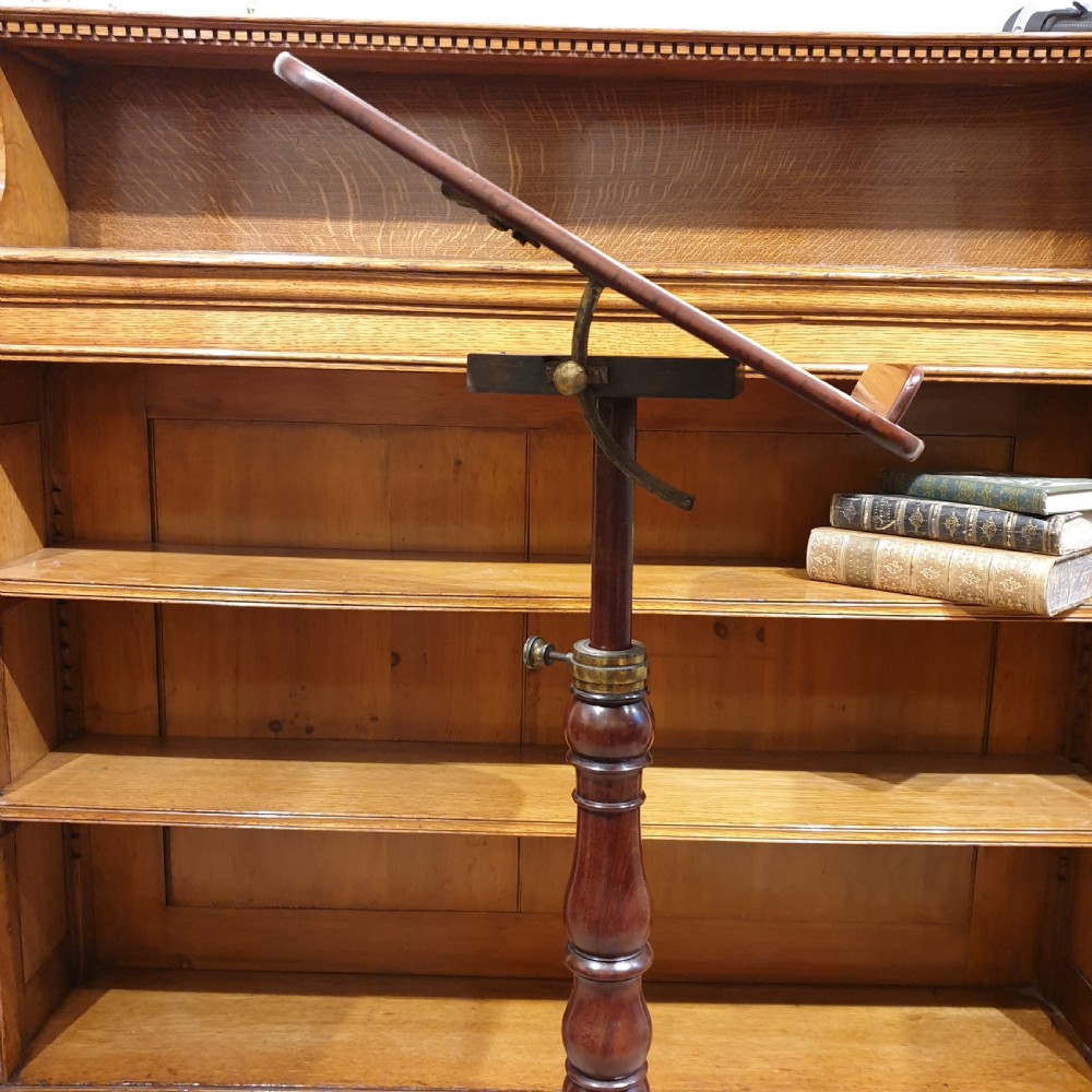 An adjustable mahogany occassional or reading table View III