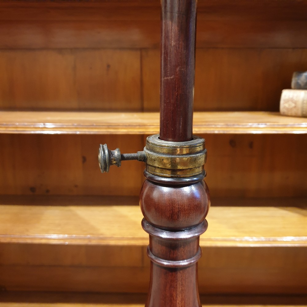 An adjustable mahogany occassional or reading table View V
