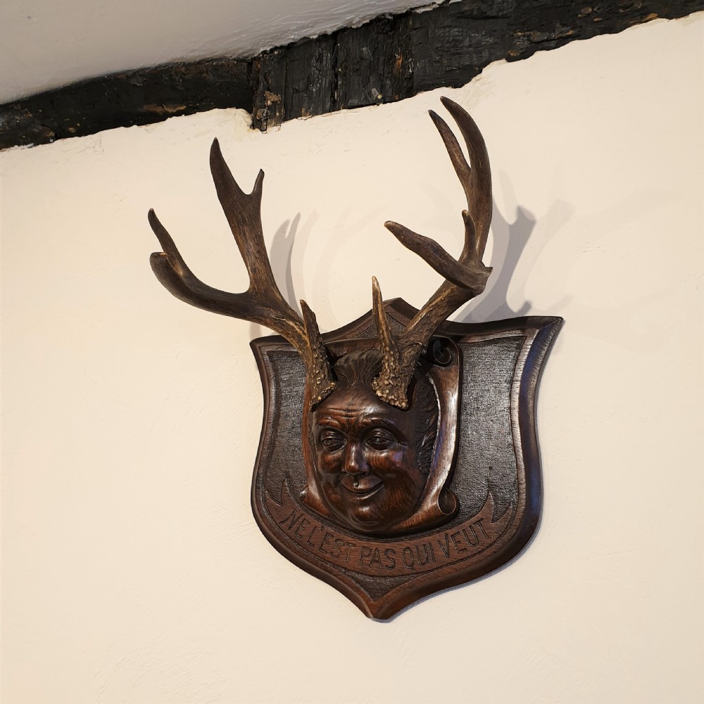 A carved oak & stag horned face mask  View II