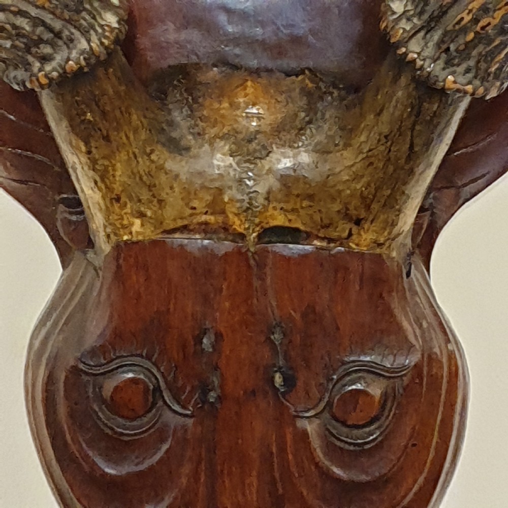 A 19th Century carved & decorated wooden stag's head  View IX