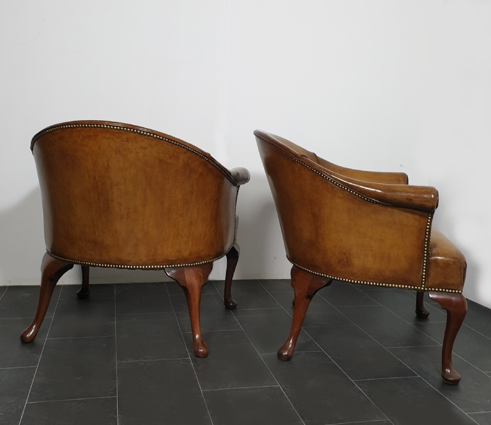 Pair of leather tub chairs View IV