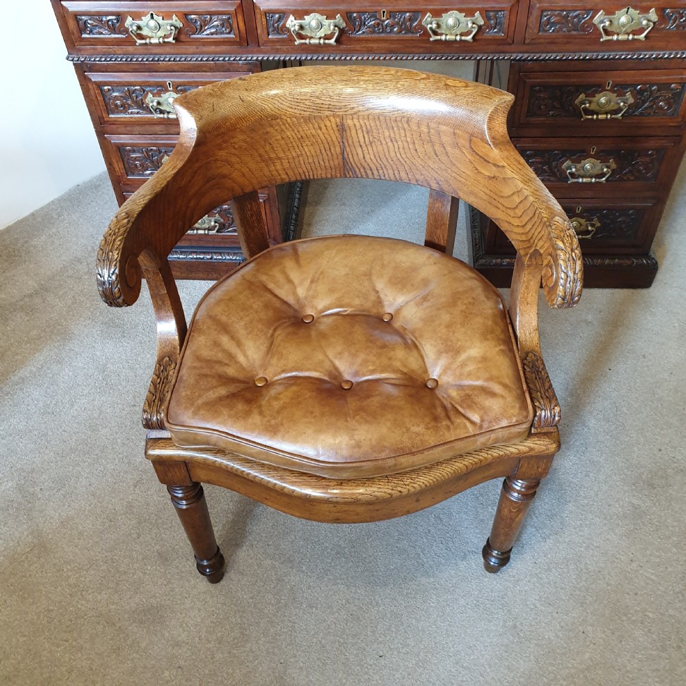 19th Century oak desk chair with caned seat & buttoned leather cushion 