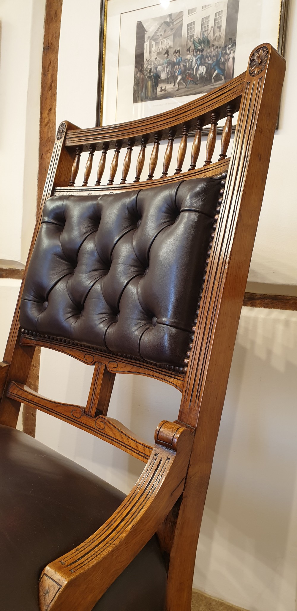 A button backed leather upholstered oak aesthetic movement armchair with a matching slipper chair  View VI