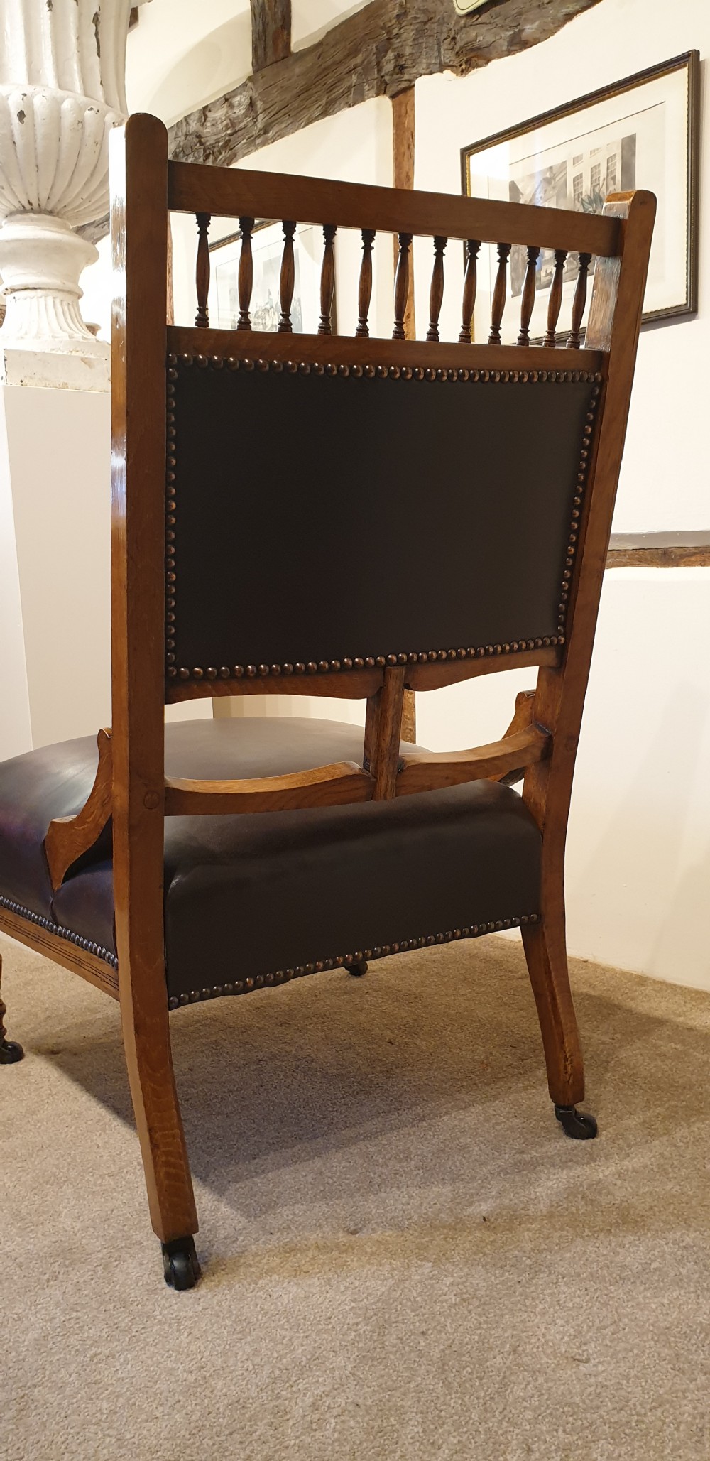 A button backed leather upholstered oak aesthetic movement armchair with a matching slipper chair  View VII