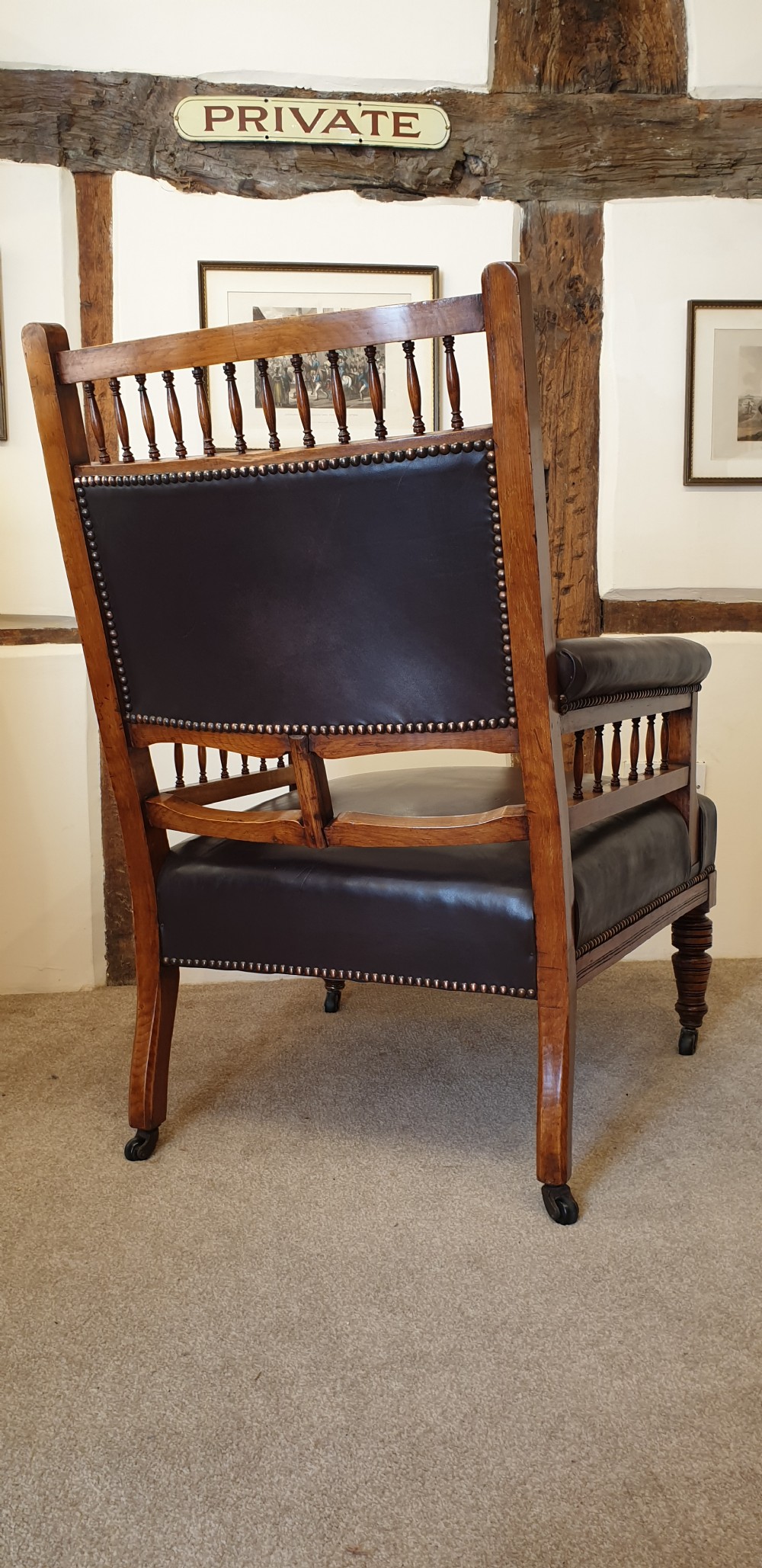 A button backed leather upholstered oak aesthetic movement armchair with a matching slipper chair  View VIII