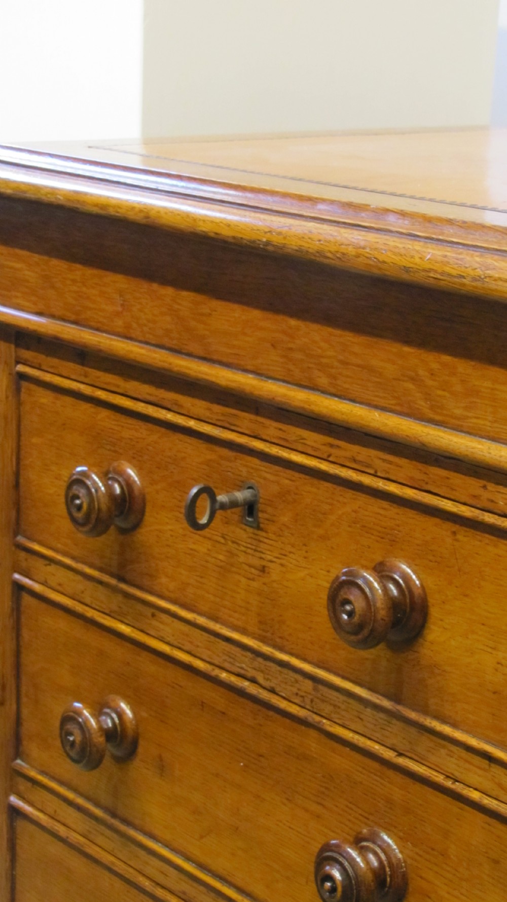 A fine 19th Century Oak Pedestal desk with paneled sides  View VII