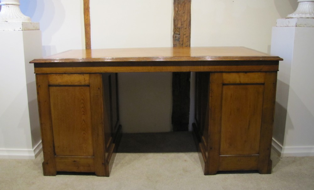 A fine 19th Century Oak Pedestal desk with paneled sides  View VIII