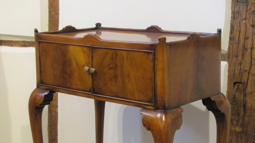 An elegant walnut occasional table  View VIII