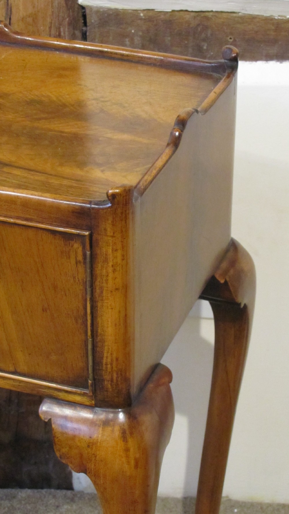 An elegant walnut occasional table  View IX