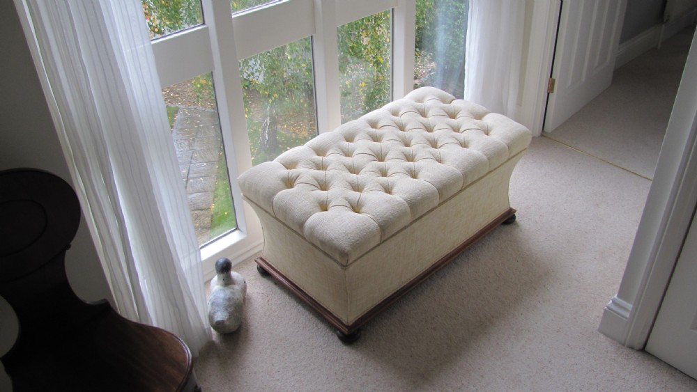A re-upholstered rosewood ottoman (Circa 1850)