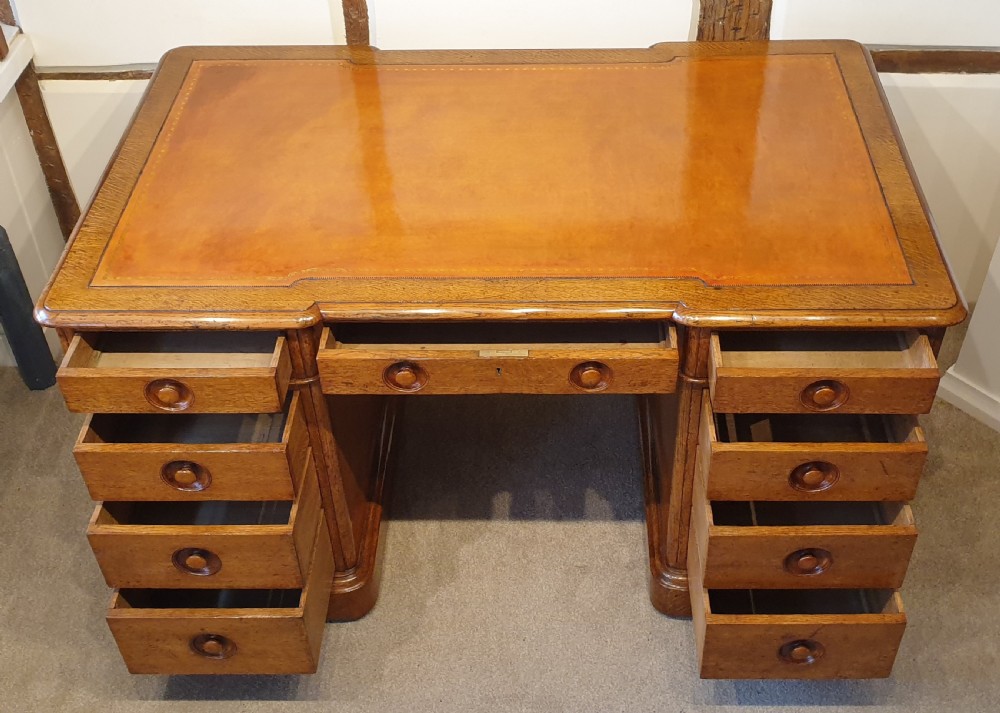 Late 19th Century oak pedestal desk with turned inset handles  View III