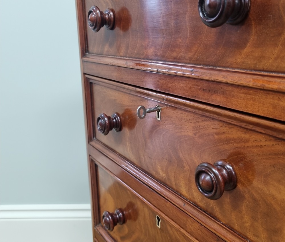 A fine pair of mahogany pedestal bedside chests with brushing slides View XI