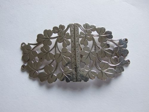 A Late Victorian Shamrock Silver Nurse's Buckle.