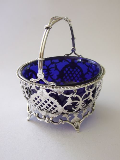 A Stunning Edwardian Silver Swing Handled Basket.
