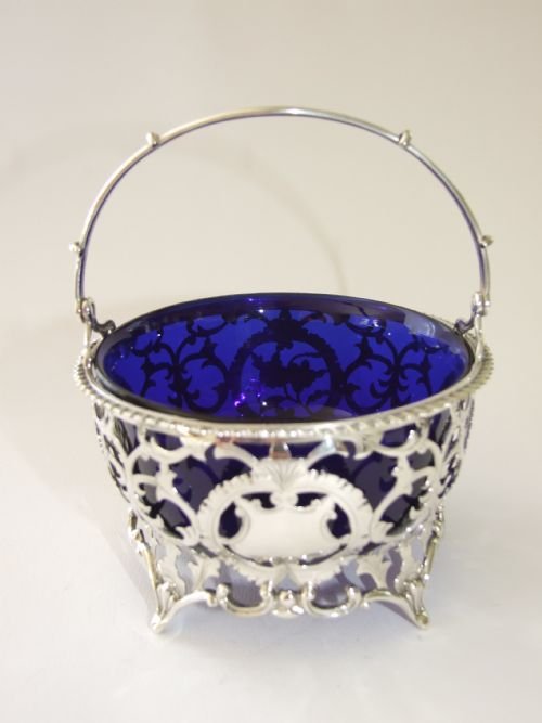 fig 1. A stunning Edwardian silver swing handled basket.
