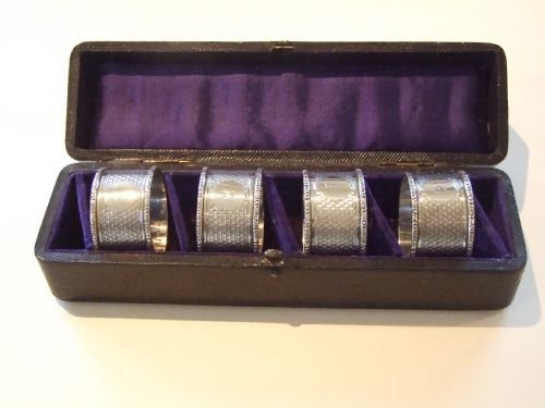 A Fine Set of Numbered and Boxed Silver Napkin Rings, Made During the First World War.