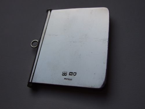 A Rare Edwardian Silver Sprung Notebook.