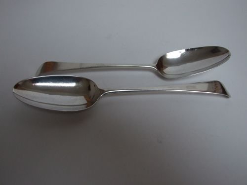 A Rare Pair of Early George III Silver Serving Spoons.