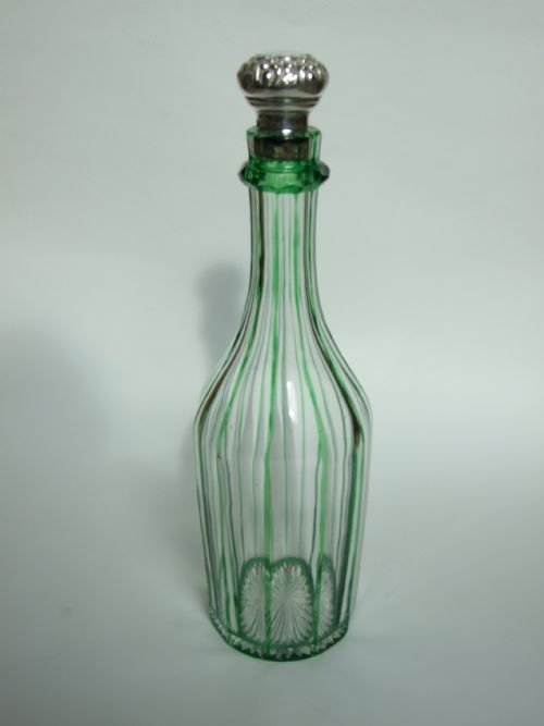 A Rare Edwardian Silver Mounted Wine Bottle.