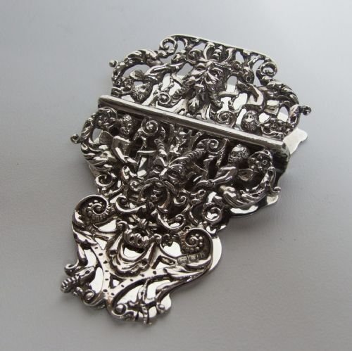 A Magnificent Victorian Rococco Silver Desk Paper Clip.