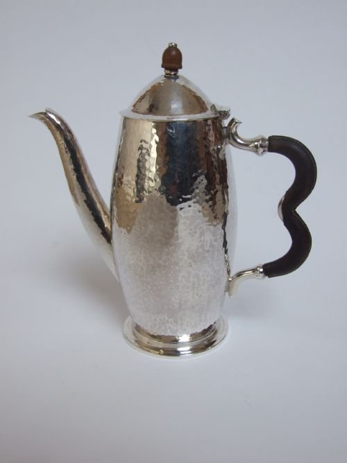 A Superb Hammered Silver Arts & Crafts Solo Coffee Pot.