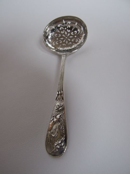 A Stunning Victorian Silver Sifter Spoon Featuring Kingfisher Motifs.