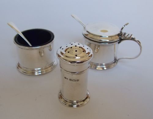A Delightful Three Piece Silver Cruet with the Original Spoons.