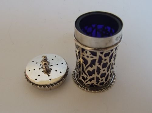 fig 1. An attractive pierced silver pepper pot by Goldsmiths & Silversmiths Co.