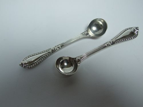 A Pair of Superb Victorian Silver Condimant Spoons in the Rare Grecian Pattern.