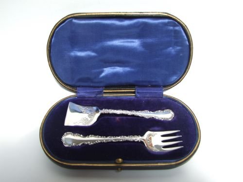 A Charming Boxed Set of Edwardian Silver Sardine Servers.