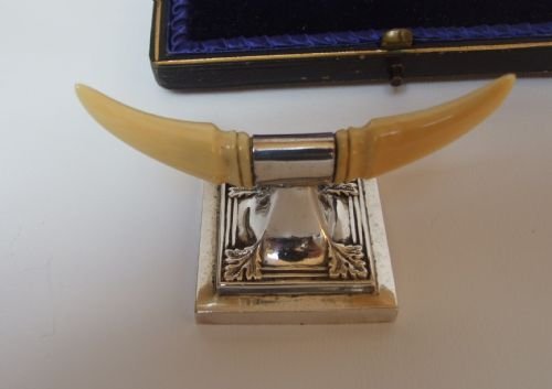 fig 1. A superb quality pair of boxed Edwardian silver and ivory knife/spoon rests.