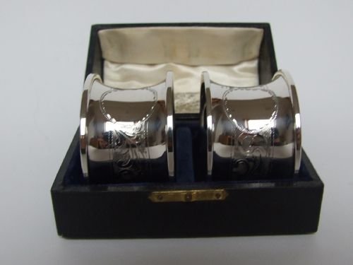 A Lovely Pair of Boxed Silver Napkin Rings with Vacant Cartouches.