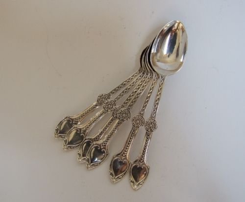 A Delightful Set of Six Edwardian Silver Coffee Spoons in Arts & Crafts Design.