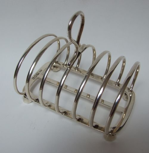 An Early George V Quality Silver Toastrack.