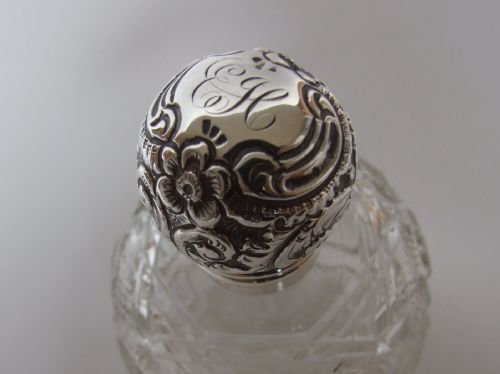 fig 1. A gorgeous Edwardian silver mounted cologne bottle.