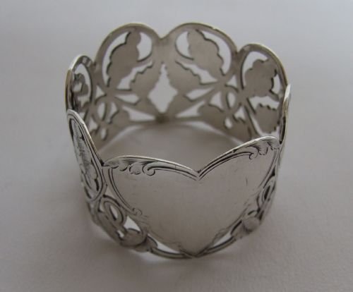 A Wonderful Pierced Edwardian Silver Napkin Ring with Heart Cartouche.