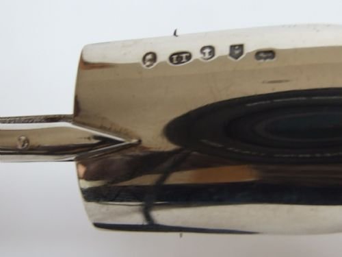 fig 1. A rare George III silver Stilton Scoop with 'pusher release'.